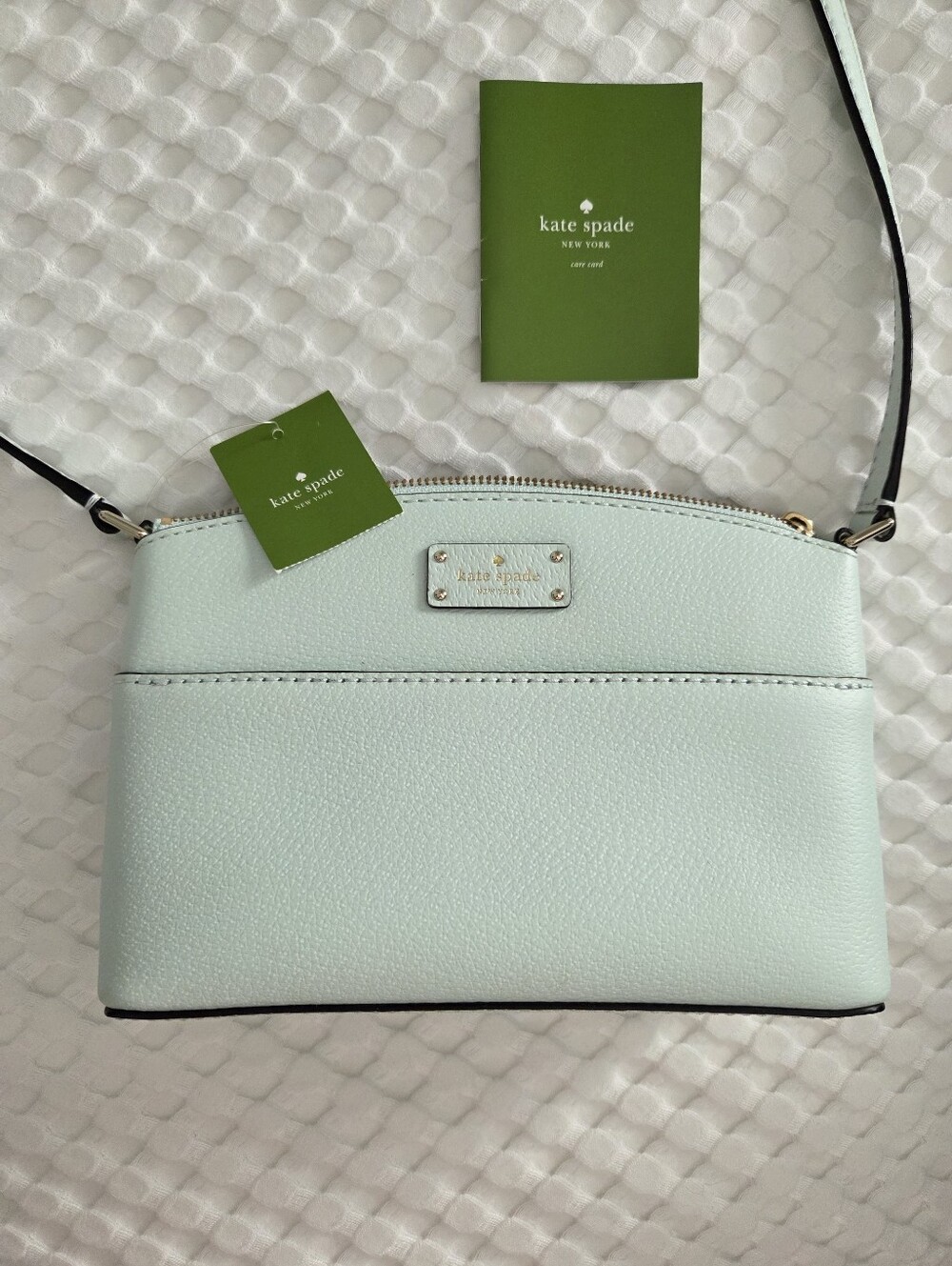 kate spade pastel mint leather crossbody with black strap